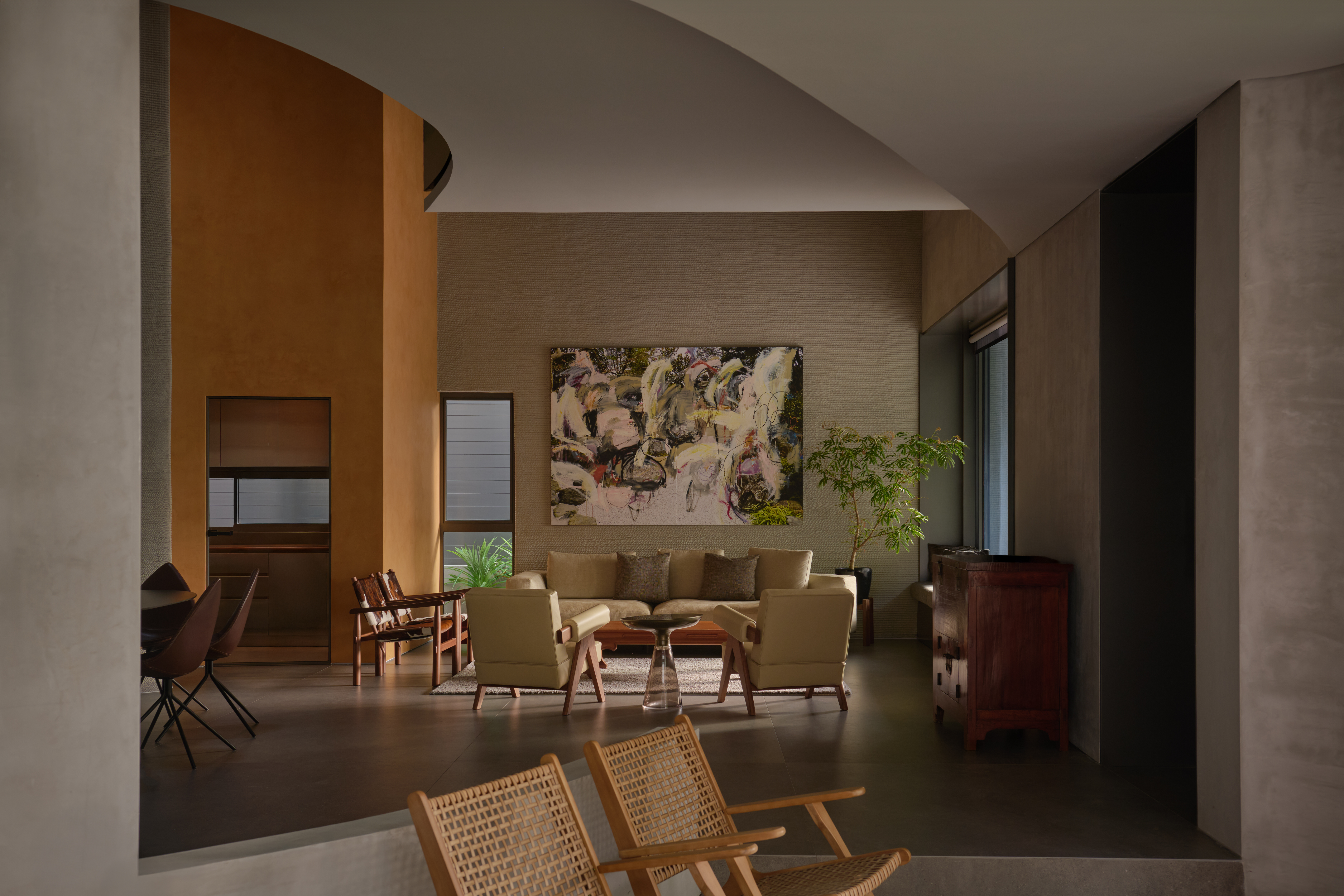 interior of living room in 3d-printed concrete house in singapore with curved block coloured walls